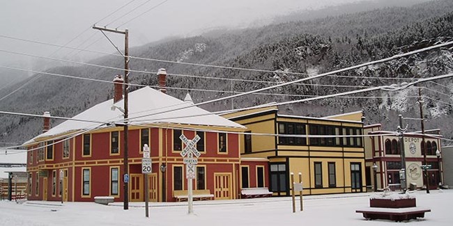 Bright buildings in a snowy scene