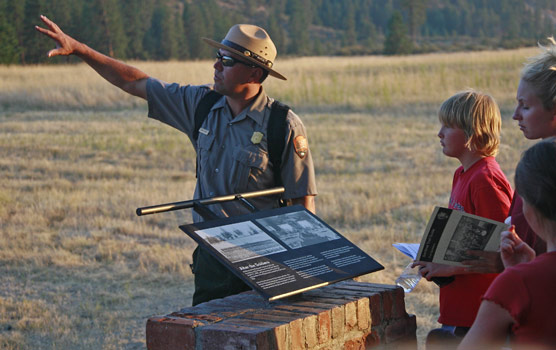 Children's Program. A ranger points out important resources on a tour.