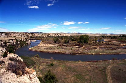 View near the confluence of the Missouri River showing one of the Three Forks in the foreground.