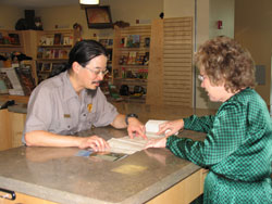 Ranger and visitor at Trail headquarters.