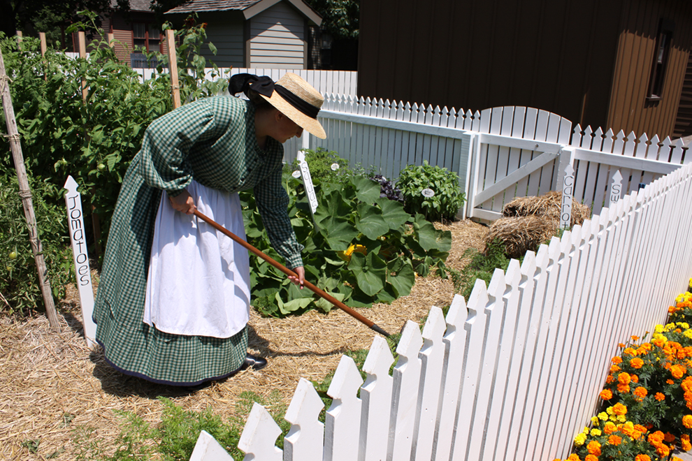 Volunteer tending to Heirloom Garden