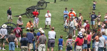 Ranger Jim Burgess leading a tour along Ricketts' Battery.