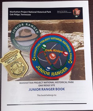 booklet, patch, and badge