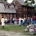 Visitors listening to a costumed Ranger at Hartwell Tavern