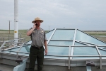A Minuteman Missile Park Ranger listens to a cell phone guided tour at Launch Facility (missile silo) Delta-09