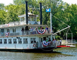 A paddleboat makes a landing at the BioBlitz site.