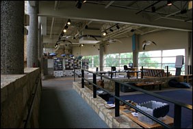 Interior of the Minnesota Valley National Wildlife Refuge Visitor Center showing exhibits and sitting area.