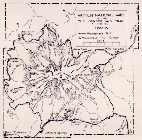 Historic map of Mount Rainier National Park showing the Wonderland Trail encircling the glacier-covered mountain.