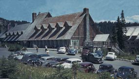 Photographed in 1941, the Paradise Inn sits behind a busy parking area.