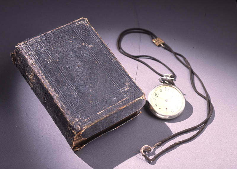 Pocket watch and bible