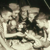 Image of Photograph of Boy Scouts Trading Patches and Pins at the 1950 Jamboree
