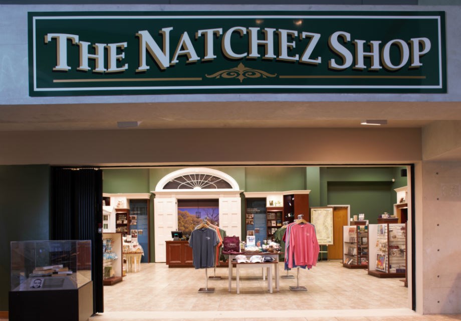 The Natchez Shop Logo above the entrance to the store