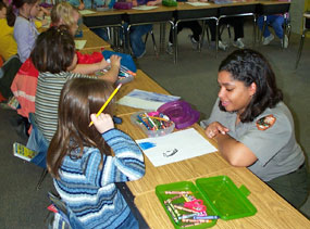 Ranger presenting environmental education program to elementary school class