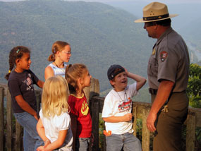 Ranger and young visitors at overlook