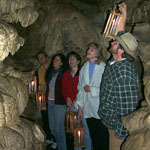 Visitors experience the Candle Light Tour.