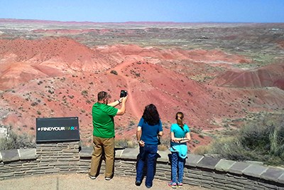 Family enjoying the view of the Painted Desert from Tiponi Point