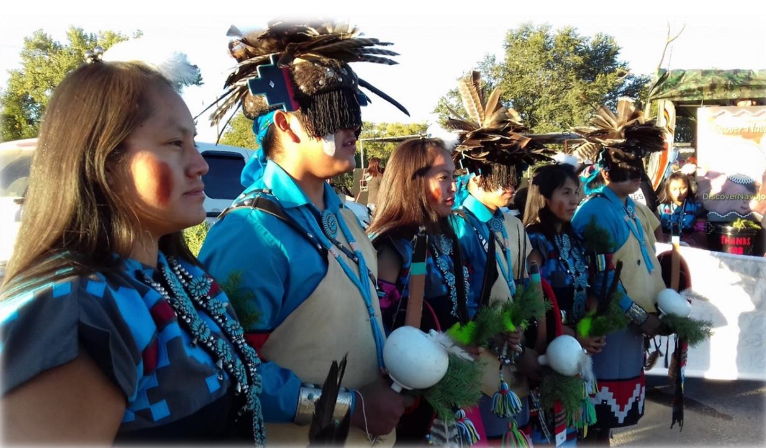 Navajo performers in traditional attire.