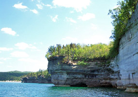 Blue sky, sunshine, Lake Superior, and the Pictured Rocks cliffs.