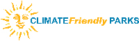 This yellow and blue on white logo for Climate Friendly Parks features a smiling sun.
