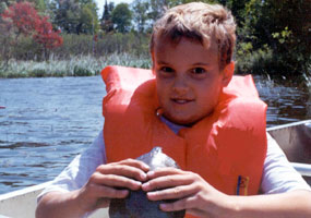 This boy caught a turtle while canoeing at Pictured Rocks National Lakeshore.  He released the turtle back into the lake shortly after the photo was taken.