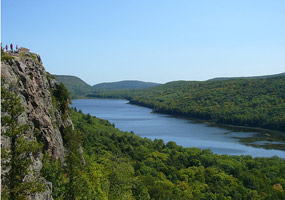 The beautiful Lake of the Clouds is surrounded by towering hills with lush green northwoods vegetation.&nbsp;