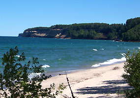 The white sands of Miners Beach stretch a half-mile just east of Miners Castle along the beautiful shores of Lake Superior.