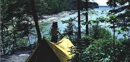 Backcountry camper at Mosquito River overlooking Lake Superior.
