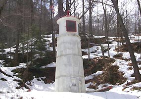 With its companion front range light, the Munising Rear Range Light helps guide mariners into Munising Bay.