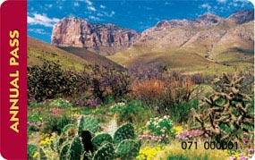 The America The Beautiful annual pass features a desert scene with mountains in the background.
