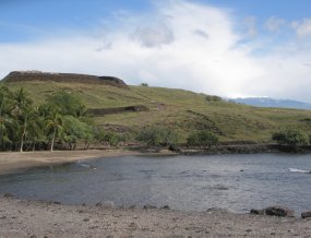 Pu'ukohola Heiau with snow covered Mauna Kea.