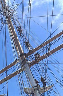 A section of the upper rigging of a 19th century sailing ship.