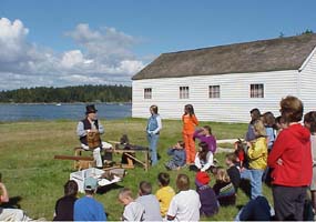 Park Ranger Ron Garner demonstrates the spoke-shaving horse.