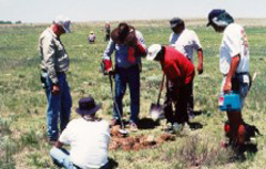 Members of the 1999 Sand Creek Massacre Project Team doing archeological fieldwork