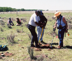 Members of the 1999 Sand Creek Massacre Project Team doing archeological fieldwork
