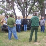 Partners at site discussing issues