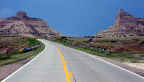 Heading west on highway 92 towards the Scotts Bluff National Monument.  Sentinel Rock is seen on the left, and Eagle Rock is seen on the right.