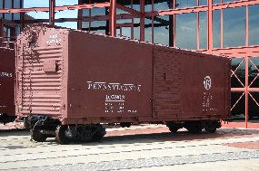 brown boxcar with white lettering