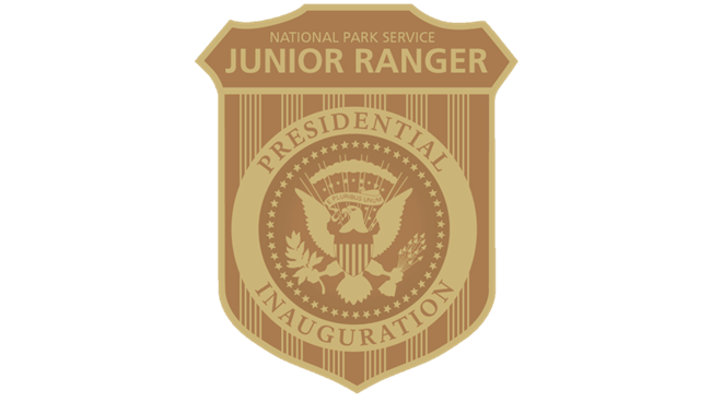 A yellow and gold badge showing the presidential seal and text that reads "National Park Service Junior Ranger Presidential Inauguration"