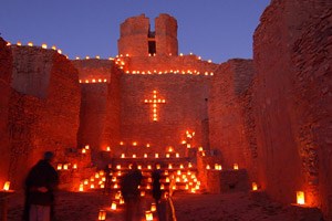 View of the steps of the church entrance and altar steps, decorated with farolitos, or little lanterns, are a Christmas tradition in Northern New Mexico. Although the pueblo and church are no longer occupied, these places are still visited, remembered, an