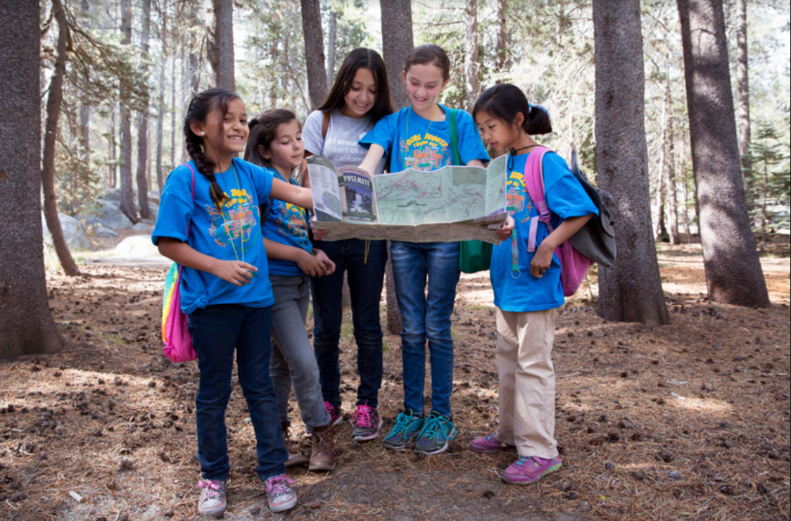 Girl Scouts reading map.