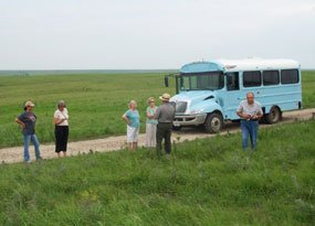 visitors enjoying a prairie bus tour