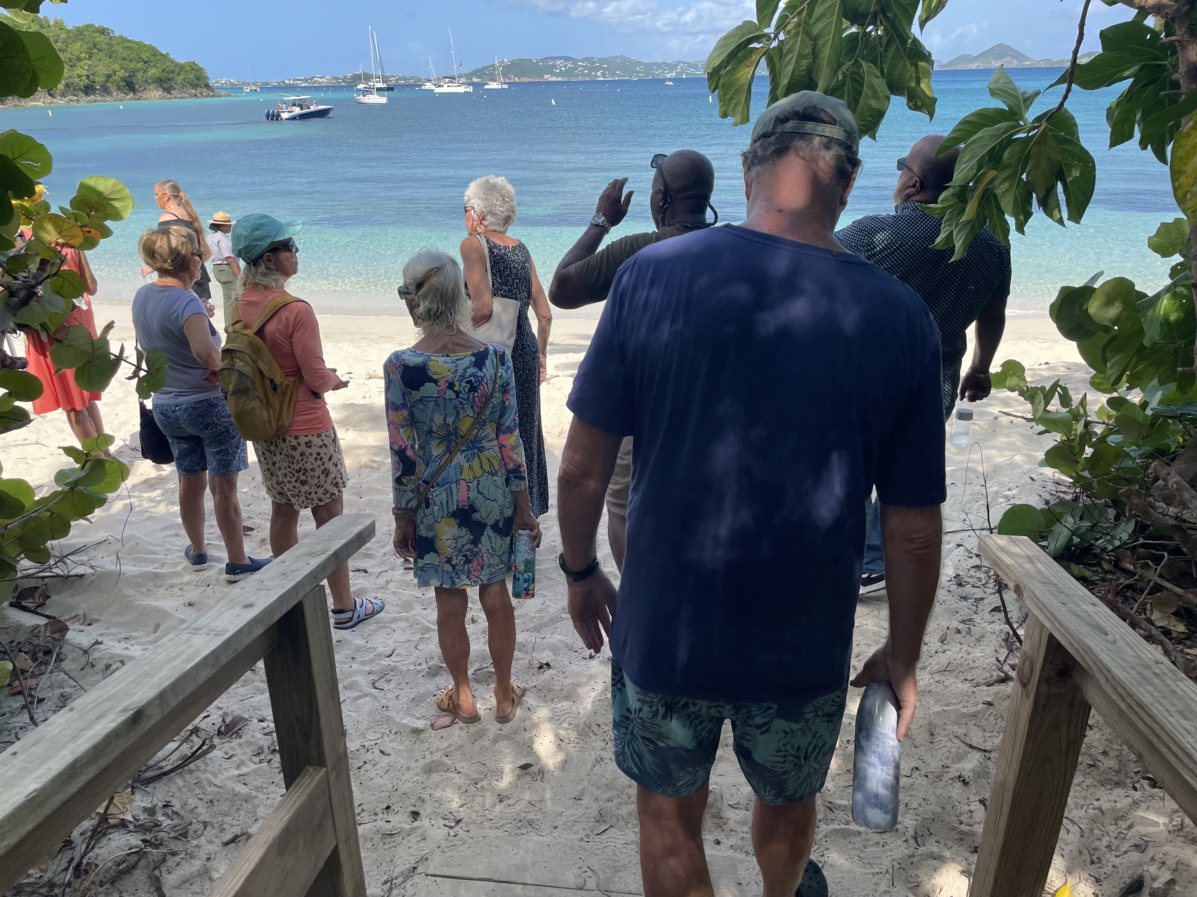 Visitors walking down new ramp onto Caneel Beach