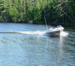 A visitor boating in the park