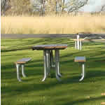 picnic table on green lawn