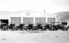 (YELL-2012-2) Another recent acquisition to the photo archives shows part of the YPT Co. fleet of maintenance or service vehicles in Gardiner. Note the tripod or 