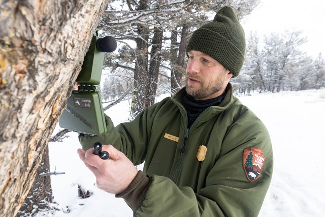 Wolf biologist Matt Metz and autonomous recording unit