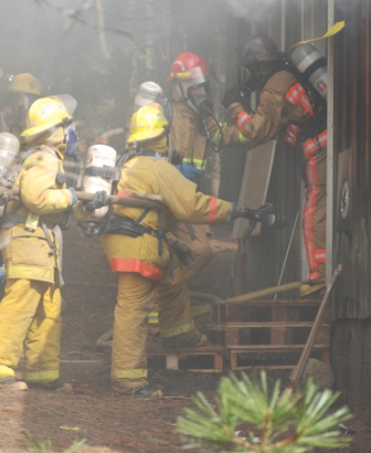 Firefighters enter building during training excercise