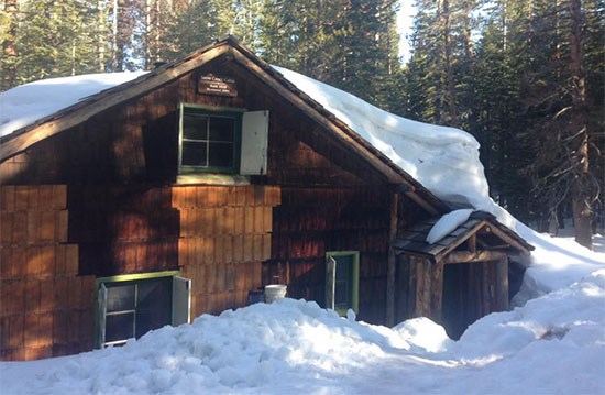 Snow Creek Cabin covered in snow