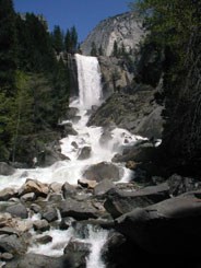 Wide Vernal Fall with Merced River in foreground