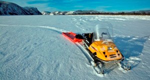 A snowmachine on the Yukon River in winter